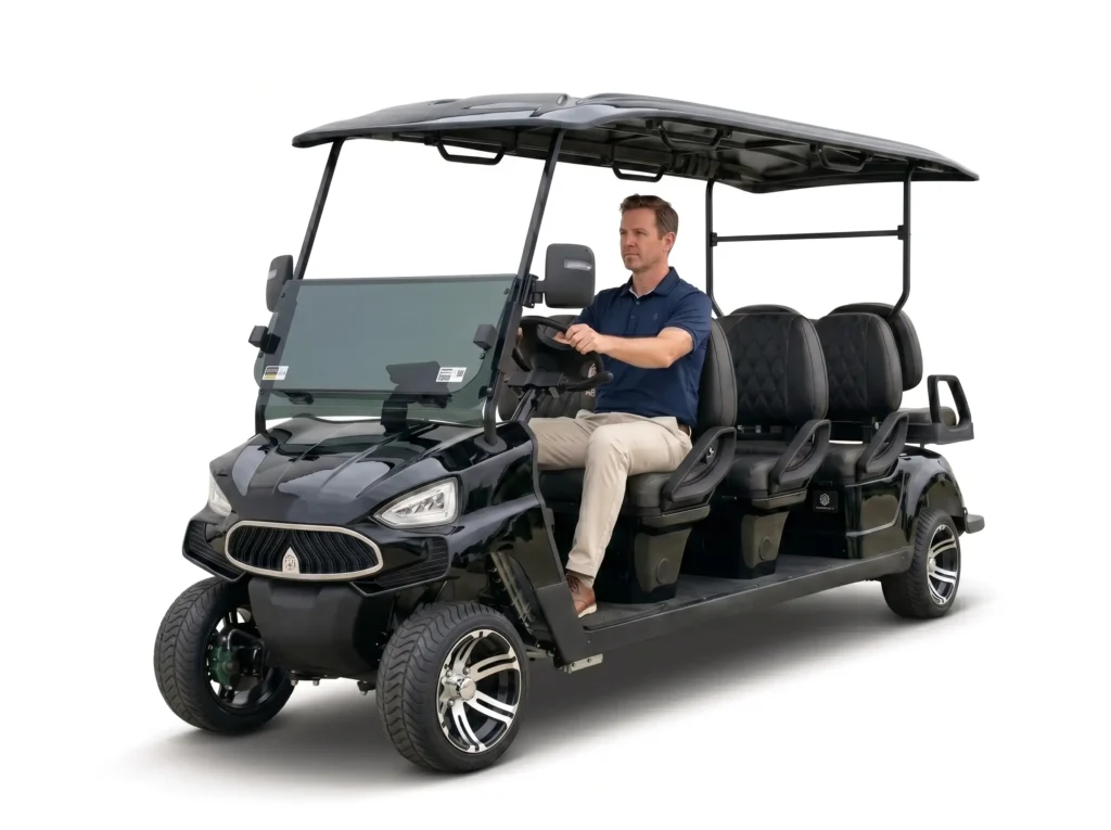 A man is driving an eight-seater black MXV ECO series SUN electric carts along the road.