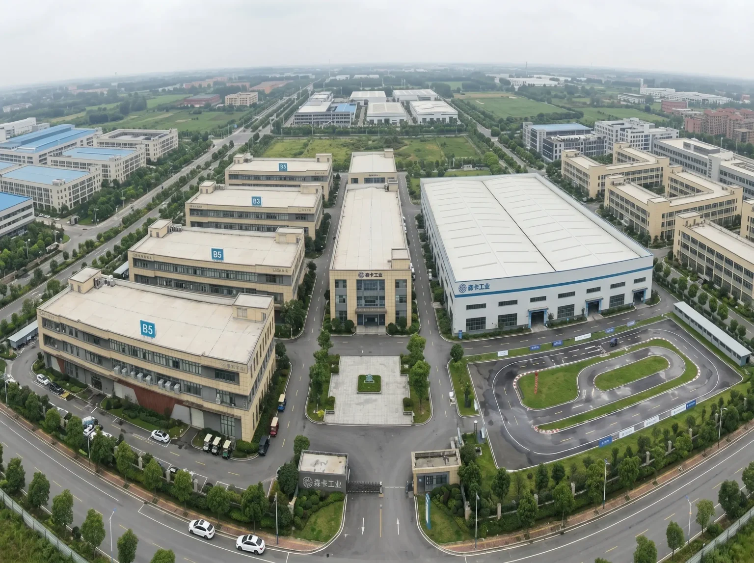 aerial view of SUN-Carts manufacturing campus with production buildings and warehouse