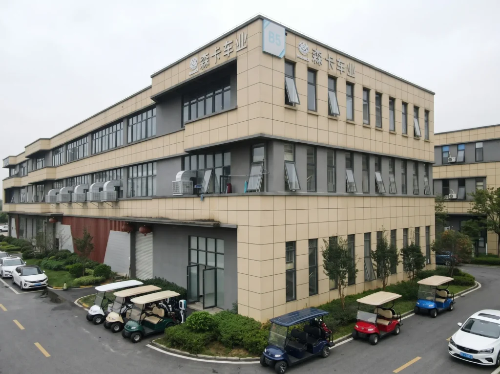 the exterior of SUN-Carts office building with company signage at the entrance