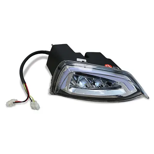 SUN-CART LED front headlight installed on an electric golf cart, showing bright white light beam and waterproof housing.