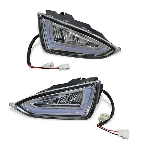 SUN-CART LED front headlight installed on an electric golf cart, showing bright white light beam and waterproof housing.